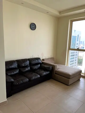 Black leather 3-seater sofa + beige loveseat, used, good condition