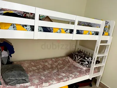 White wooden bunk bed with ladder - good condition from Homerus.