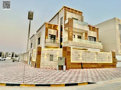 Villa with all registration and ownership fees included, on the main street, ready to move in, in one of the most prestigious areas of Ajman, freehold