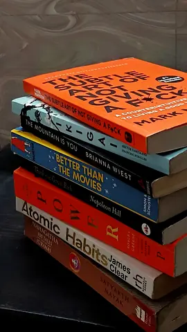 Stack of Action/Adventure  Personal Development Paperbacks — Mixed Titles, Good Condition