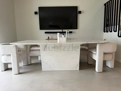 Elegant Marble Dining Table with Soft Chairs