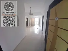 A spacious one-bedroom apartment with a balcony overlooking the Al-Aliya area, close to all services