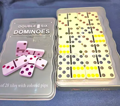 Beautiful brand new dominoes with set of 28 colour tiles and six games for sale
