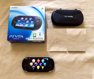 PS VITA 3G/WIFI + 8GB Memory Card + Carry Case.