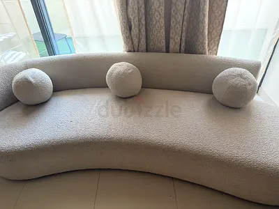 Curved Sofa with Decorative Cushions
