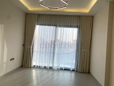 Beige floor-to-ceiling curtains with sheer panel — excellent condition