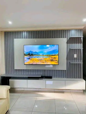 Sleek Slat-Wall Media Center with Modern Accents