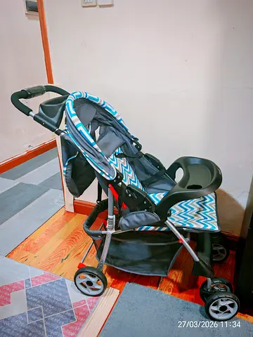 Standard baby stroller with tray, canopy and storage basket - good condition