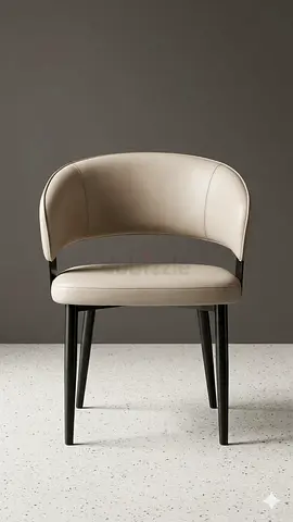 Beige upholstered dining chair with curved back