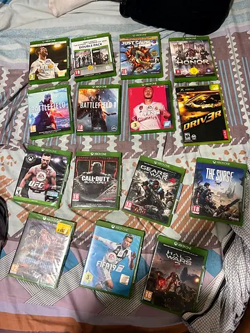 My Xbox One game collection — 15+ titles including FIFA, Battlefield, Gears, Cod