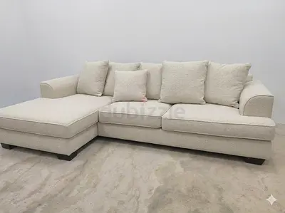 The One Brand beige color lshape sofa