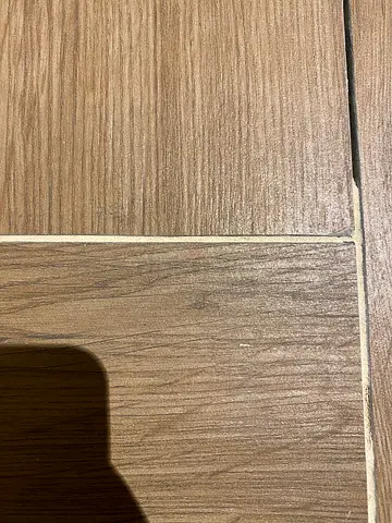 Tile grouting