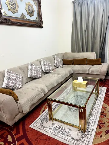L-Shaped Sofa with Decorative Cushions