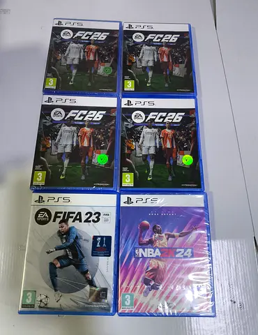 Collection of PS5 Video Games: FIFA 23, NBA 2K24, and FC 26, CALL of DUTY