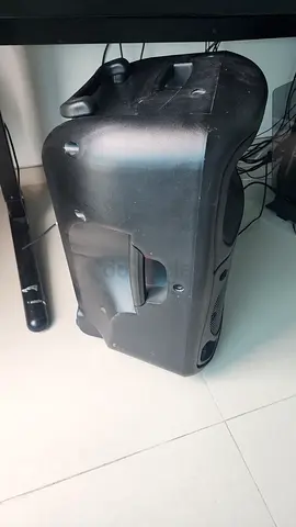 Black PA speaker with microphone - used, working properly equipped with Bluetooth.