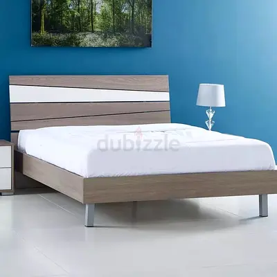 King size bed and matresModern platform bed with decorative slanted headboard — used, good condition