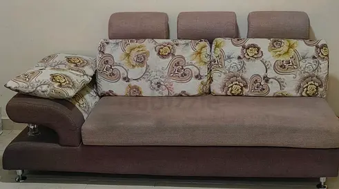 Stylish L-Shaped Couch with Floral Cushions
