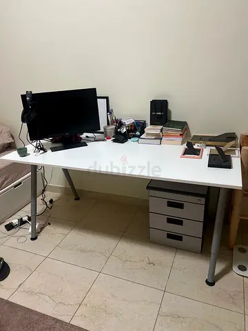 Modern Study Desk table and separate storage drawer. The desk’s height can be adjusted up to 10 cm.