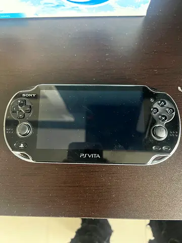Sony PlayStation Vita Handheld Console with psvita game included