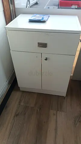 Minimalist White Cabinet with Drawer