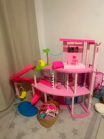 Barbie dream house and Chelsea van