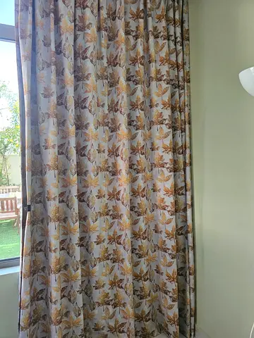 Full-length floral curtains (pair) — gently used in excellent condition. Size 250 * 290