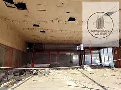Open warehouse + showroom + indoor showroom on a main road in Ajman Industrial Area 2, with a large