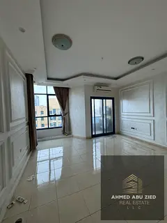 Two-bedroom apartment with a living room for annual rent in Al Khor Towers, with a distinctive view