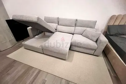 Eskilstuna L shape sofa bed under storage space