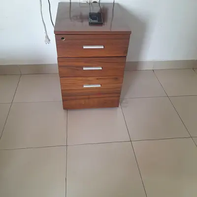 Wooden Nightstand with Three Drawers