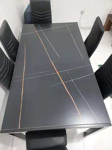 Modern Black Dining Table with Unique Design