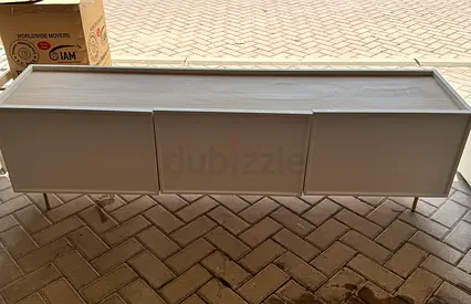 White low TV console - 3-door entertainment unit