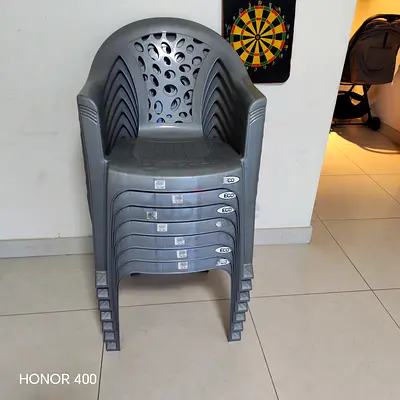 Set of 7 Grey Stackable Plastic Chairs - Used