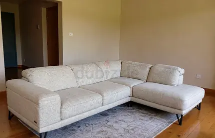 Almost like new condition Natuzzi L shape sofa
