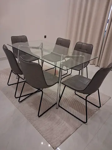 Modern Glass Dining Table with Stylish Chairs