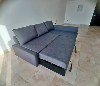 Gray pull-out sofa bed - used, good condition