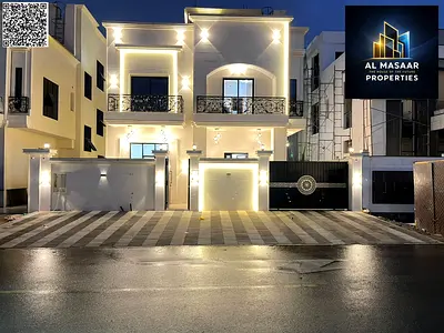 Seize the opportunity and own a luxurious classic villa with a roof terrace in Ajman. First occupancy, freehold ownership, central air conditioning, a