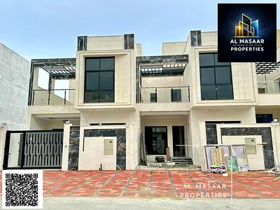 Townhouse villa for sale in Al Yasmin - Modern design, ground floor, first floor and roof with super deluxe finishes, including registration and owner