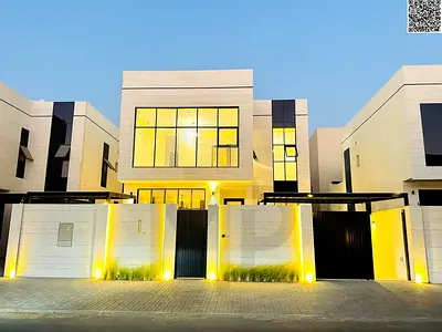 Villa (on street and alley) for sale in Ajman | Al Zahiyah area | 4 bedrooms, majlis, 2 living rooms, maid's room, and roof terrace | Freehold | Price