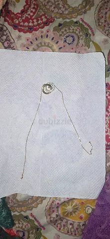 Swarovski Interlocking Rings Necklace - Brilliant Crystals (Needs Chain Repair)
قلادة سوارفسكي أصلية