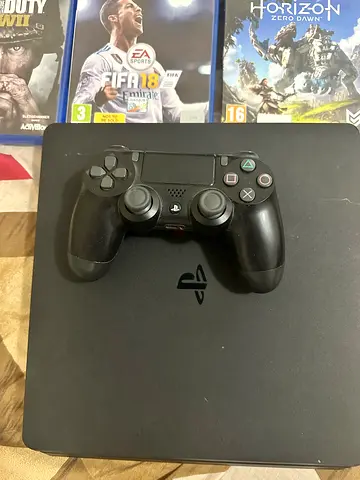 PS4 1 tb + DualShock 4 + 8 Games (Horizon, FIFA, Call of Duty, Unchartered, Far Cry etc….