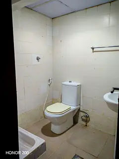 Room with seprate bath in Hamdan street behind Al Maria Mall