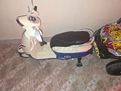 Kids Electric Ride-on Scooter and car