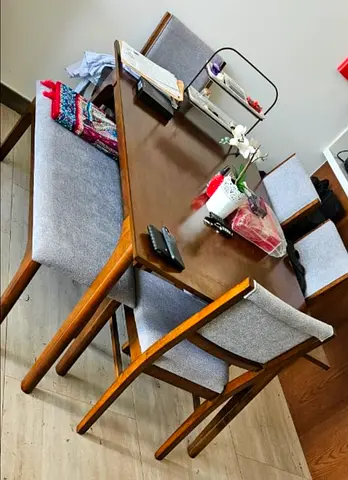 Wooden Dining Table with Gray Upholstered Chairs