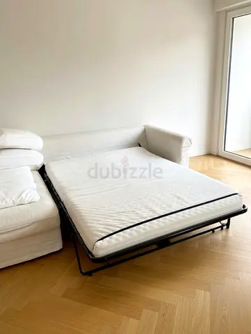 L-Shaped gronlid white colour sofa bed