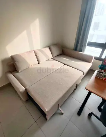 Ikea L Shape Sofa cum bed with big storage in L
