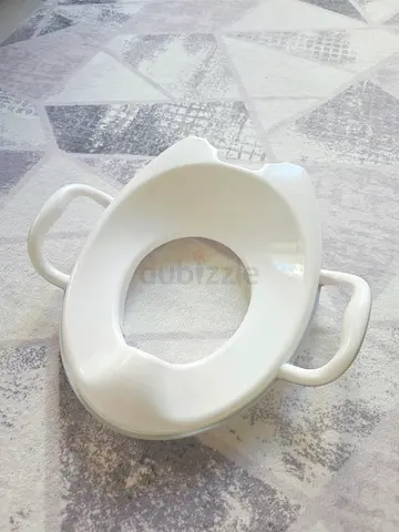 Potty training baby toilet sit