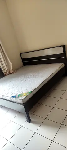 King Size Bed with mattress and side tables