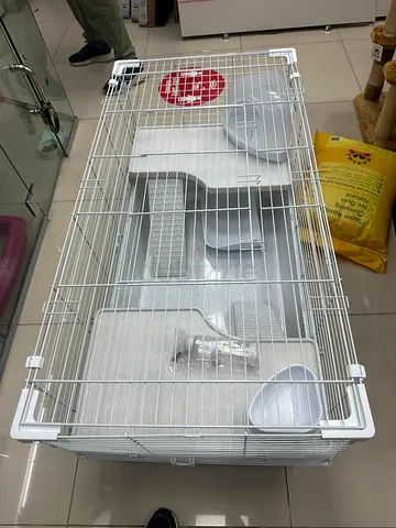 White multi-level rabbit/rodent cage with trays and bowls - used, good condition