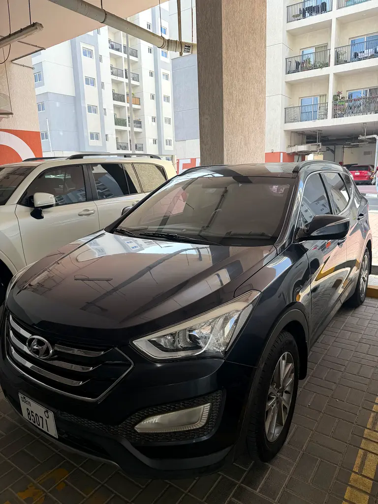 Hyundai Santa Fe 2014 — photo 1 of 3